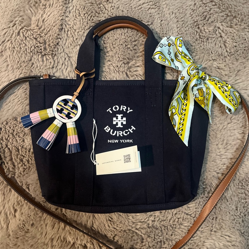 Designer shoulder bag. Navy blue with tag.